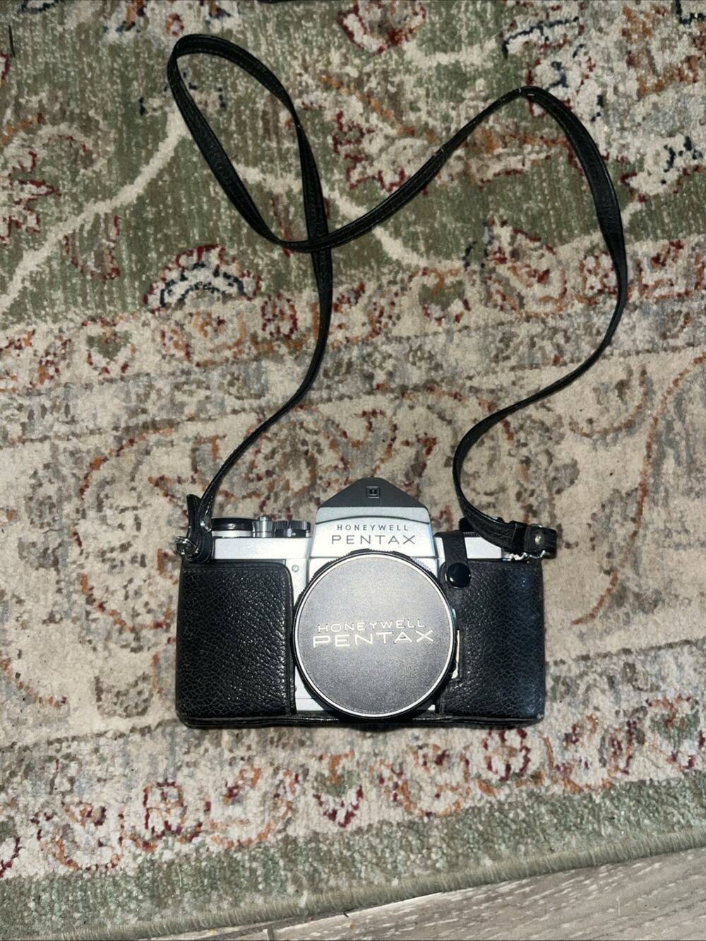 Vintage Honeywell Pentax 35 Mm Camera Features A Classic Silver And Black Finish